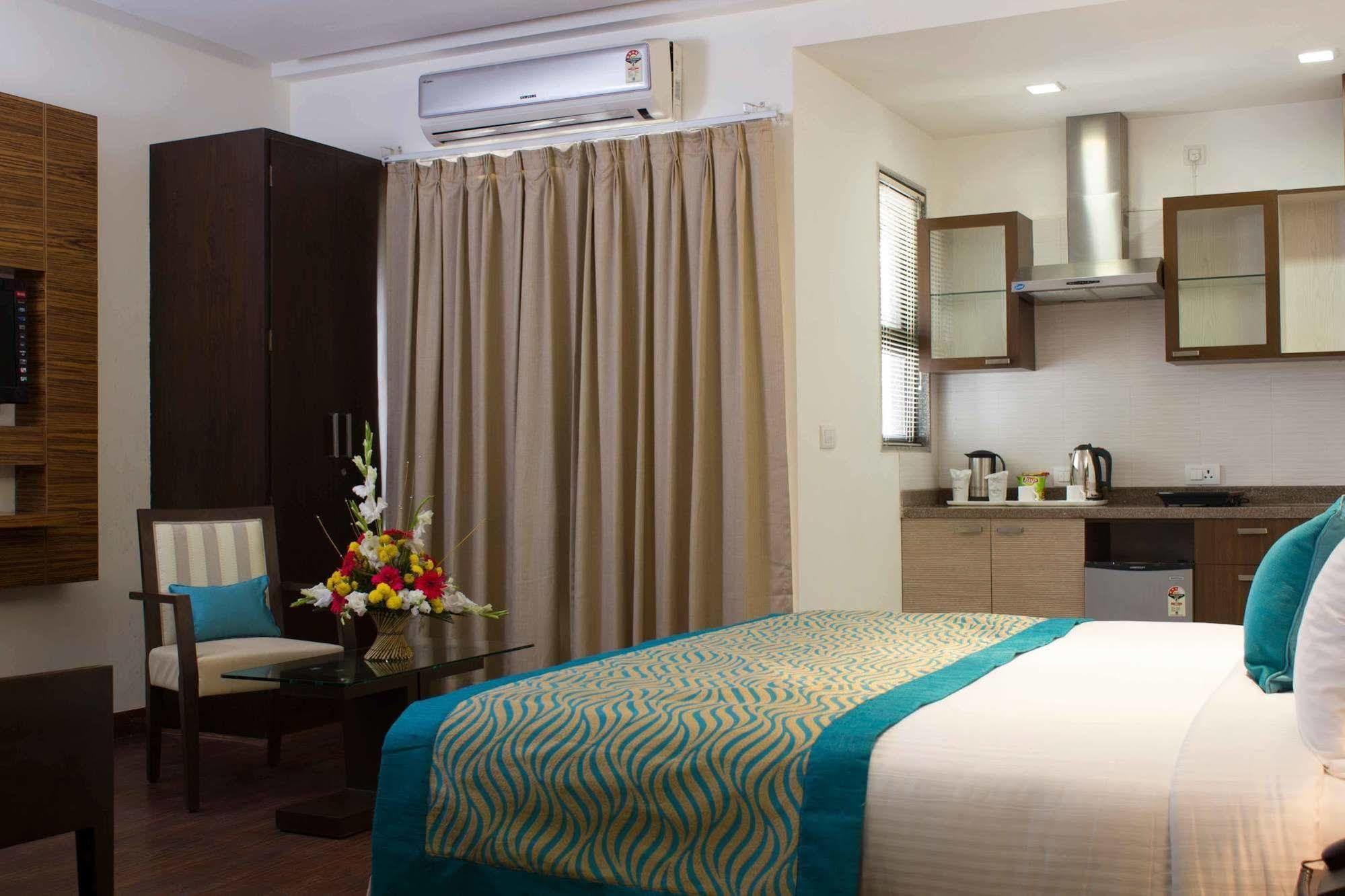 Stately Suites Mg Road Gurgaon Extérieur photo